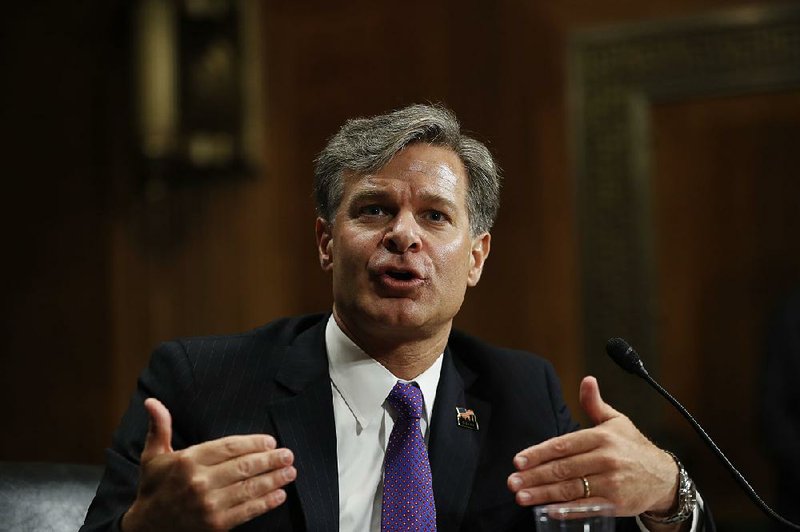 Christopher Wray, seen testifying July 12 on Capitol Hill at a hearing before the Senate Judiciary Committee, was confirmed Tuesday to replace James Comey as director of the FBI. 