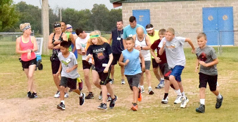 Photo by Mike Eckels Thirty runners of all ages began the 2016 Decatur Barbecue 5K Fun Run from Edmiston Park in Decatur Aug 6, 2016. This event is one of the most popular sporting events of the Barbecue. This year&#8217;s run kicks off at 7 a.m. August 5 from the parking area at Edmiston Park in Decatur.