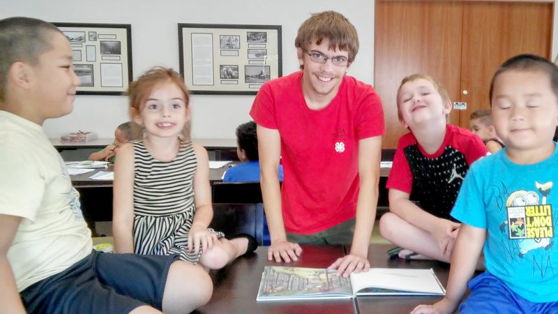 Submitted Photo Truman Lee (left), Kaylee Matlow, William Crawley (Bloomfield 4-H Club volunteer), Tegan Denson and Samuel Lee are pictured during the July 17 session which focused on protecting rivers and lakes and keeping water clean.