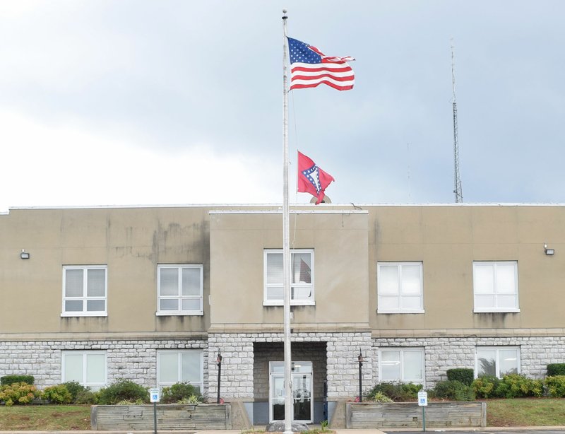 Photo by Mike Eckels The front of Decatur City Hall took on an entirely different look July 28 after two trees that once stood on either side of the main entrance were removed.