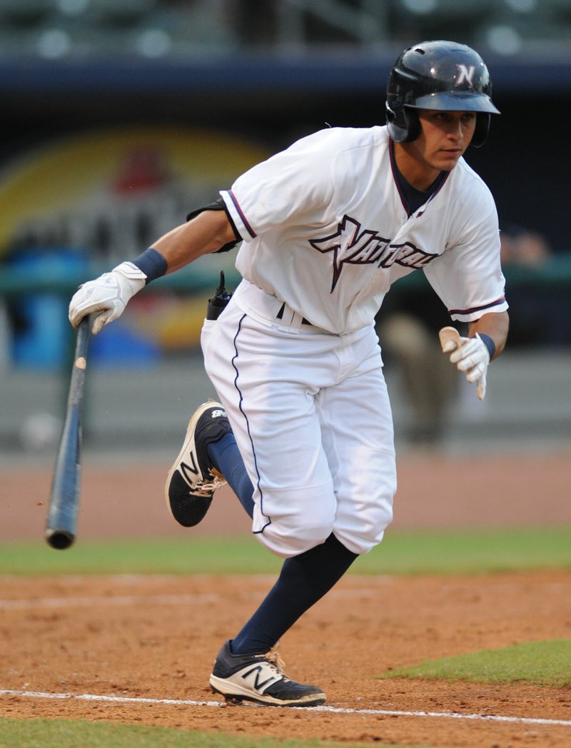 Northwest Arkansas Naturals shortstop Nicky Lopez heads to first after connecting with the ball against the Arkansas Travelers Tuesday, Aug. 1, 2017, during the third inning at Arvest Ballpark in Springdale. Visit nwadg.com/photos to see more photographs from the game.