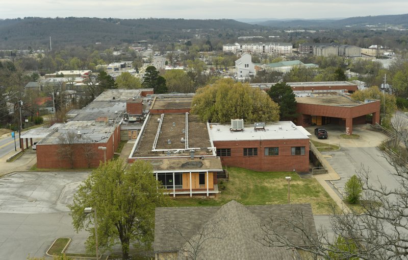 NWA Democrat-Gazette/ANDY SHUPE The old City Hospital building stands March 16 south of the Fayetteville Public Library.