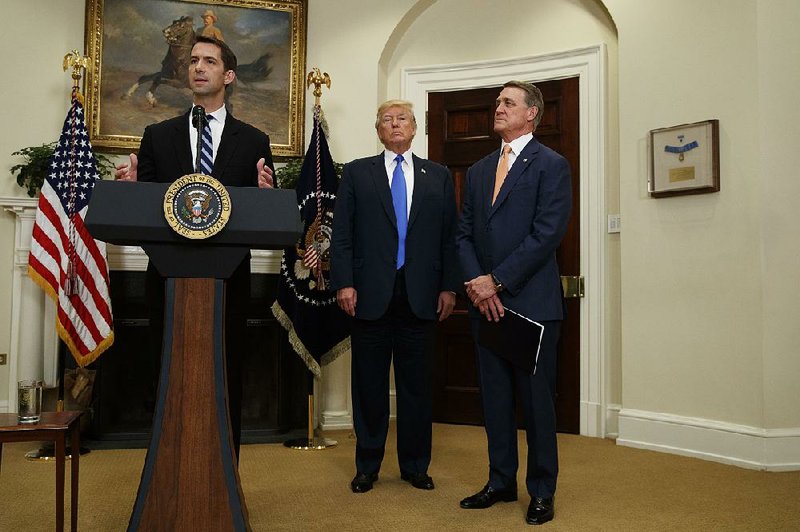 U.S. Sen. Tom Cotton (left), speaking Wednesday at the White House alongside President Donald Trump and Sen. David Perdue, called the current legal immigration system “an obsolete disaster.” 