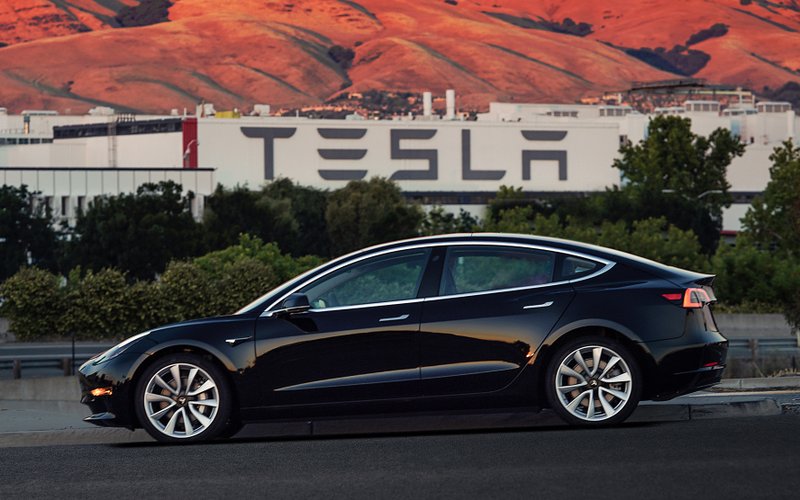 FILE - This file image provided by Tesla Motors shows the Tesla Model 3 sedan. Tesla Motors Inc. reports earnings on Wednesday, Aug. 2, 2017. (Courtesy of Tesla Motors via AP, File)