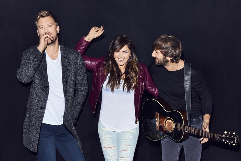 Charles Kelley, left, of contemporary country sensation Lady Antebellum, says the trio’s new album “Heart Break,” released June 9, is their best yet. The group returns to the Walmart AMP Saturday night