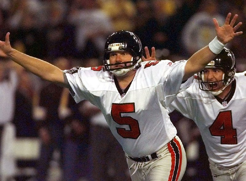 In this Jan. 17, 1999, file photo, Atlanta Falcons kicker Morten Andersen (5) and holder Dan Stryzinski (4) celebrate Andersen's 39-yard field goal to give Atlanta a 30-27 overtime win over the Minnesota Vikings in the NFC Championship in Minneapolis. 