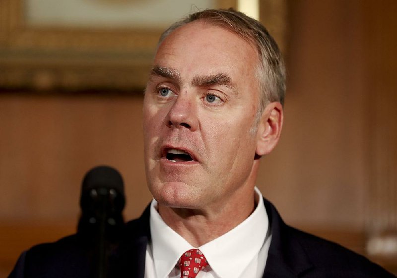Interior Secretary Ryan Zinke speaks at the Interior Department in Washington, Wednesday, April 26, 2017, before President Donald Trump signed an Antiquities Executive Order. 