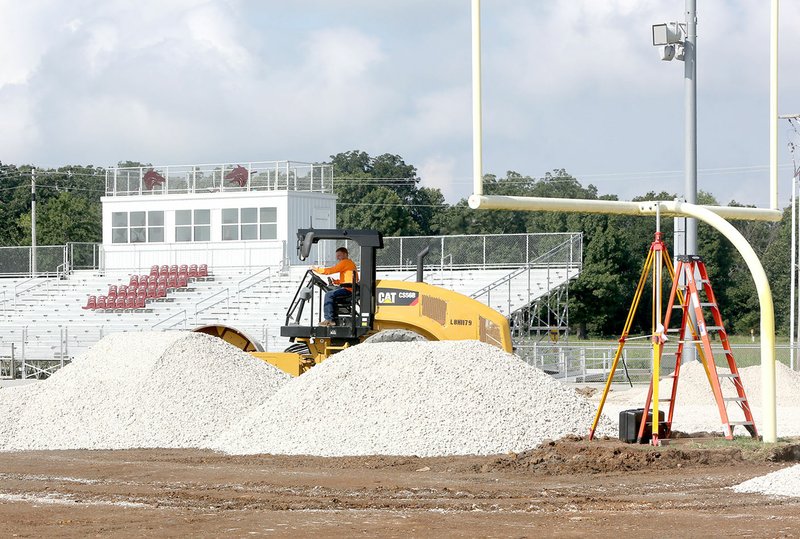 Layers of gravel are spread out Wednesday as work continues at Wolf Pack Stadium in Lincoln. The football field is being prepared for an artificial surface.