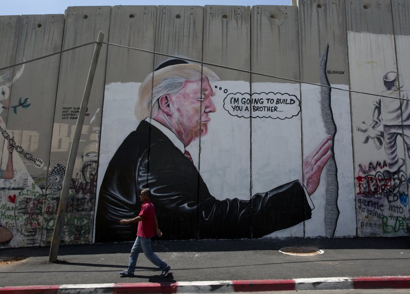 2 Huge Trump Murals On West Bank Barrier Banksys Work Hot Springs Sentinel Record 4488