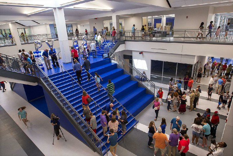 Parents and students of Pinnacle View Middle School tour the Little Rock School District building Saturday. 
