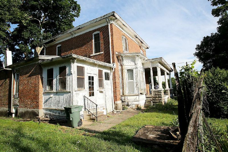 The historic Stone-Hilton House at 306 E. Lafayette St. in Fayetteville’s Washington-Willow Historic District has fallen into disrepair after years of neglect. 