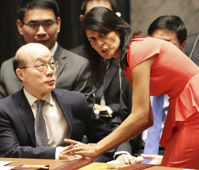 Nikki Haley, the U.S. ambassador to the United Nations, talks with her Chinese counterpart, Liu Jieyi, before the Security Council’s unanimous vote Saturday on North Korean sanctions.