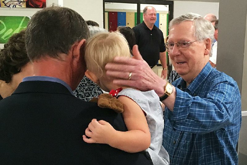 Senate Majority Leader Mitch McConnell attends the Graves County Republican Breakfast in Mayfield, Ky., on Saturday. McConnell said Saturday that he was open to a bipartisan effort to improve the health care law, but he also said there was “still a chance” to repeal and replace the current law.