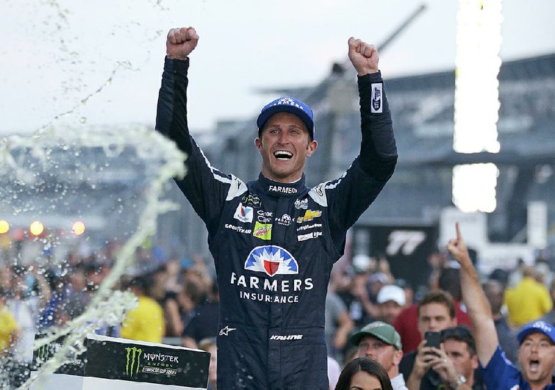 Kasey Kahne (5) celebrates winning the NASCAR Brickyard 400 auto race at Indianapolis Motor Speedway in Indianapolis, Sunday, July 23, 2017. 