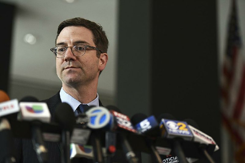 The head of Chicago’s legal department, Edward Siskel, listens to a question during a news conference at the Dirksen Federal Courthouse on Monday.