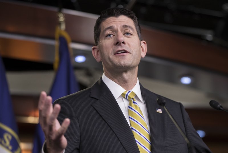 In this July 27, 2017 file photo, House Speaker Paul Ryan of Wis. meets with reporters on Capitol Hill in Washington. With his dysfunctional Congress on recess, Ryan has turned his focus back home, touring flood damage and visiting local businesses in Wisconsin. 