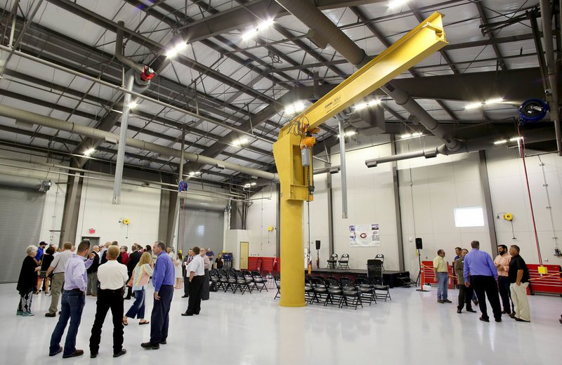 NWA Democrat-Gazette/DAVID GOTTSCHALK A 5-ton jib crane stands near the center of the Diesel Lab on Tuesday in the new Gentry Career and Technical Education Center on the high school campus. Guests, dignitaries and school personnel attended opening of the center designed for the Bentonville, Decatur, Gentry and the Gravette school districts.