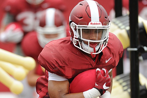 Arkansas running back Chase Hayden goes through practice Tuesday, Aug. 1, 2017, in Fayetteville. 