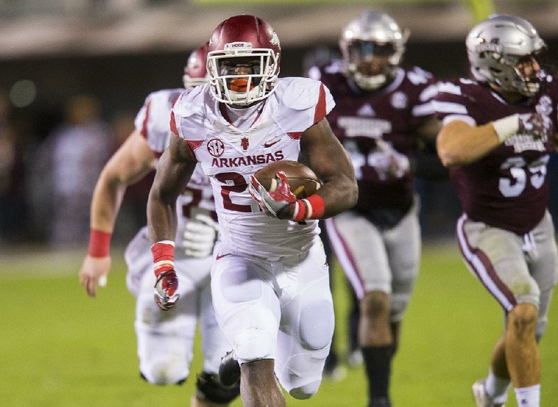 NWA Democrat-Gazette/JASON IVESTER
Arkansas running back Rawleigh Williams (22) races to the end zone for a touchdown against Mississippi State on Saturday, Nov. 19, 2016, at Davis Wade Stadium in Starkville, Miss., during the second quarter.