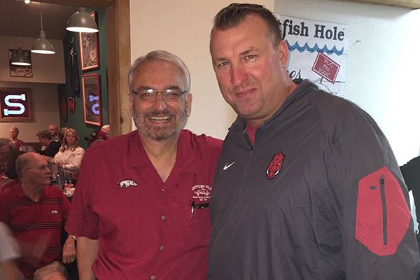 Pat Gazzola, left, was the co-owner of the Catfish Hole and a longtime supporter of the Razorbacks. 