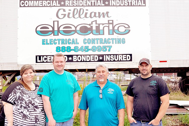 RACHEL DICKERSON/MCDONALD COUNTY PRESS Office manager Kim Banchi, left, estimator Alex Carlson, president Steve Gilliam and inside project manager Shannon Freeman are pictured outside Gilliam Electric in Anderson.