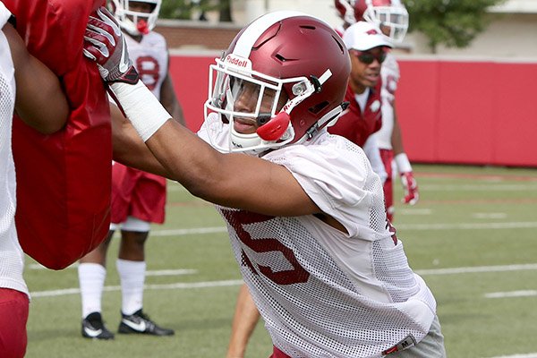 Arkansas cornerback Korey Hernandez goes through practice Thursday, July 27, 2017, in Fayetteville. 