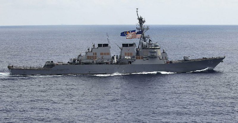 The USS John S. McCain, shown here in 2011, sailed near China’s man-made Mischief Reef on Thursday in the South China Sea. 