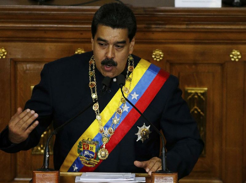 Venezuela’s President Nicolas Maduro addresses constitutional assembly members during a special session Thursday at the National Assembly building in Caracas. In his remarks, Maduro said he wants a stronger relationship with the United States.  