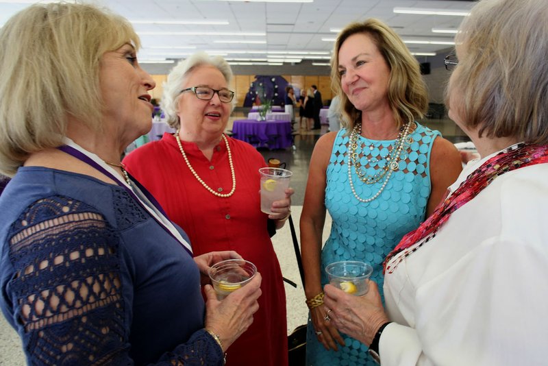 NWA Democrat-Gazette/DAVID GOTTSCHALK Susie Stewart (from left), a 2016 inductee into the Fayetteville Schools Hall of Honor, Martha McNair, a 2017 inductee, Laura Underwood, a 2017 inductee, and Thelma Tarver visit Thursday, August 10, 2017, prior to the formal announcement of the 21st Annual Hall of Honor inductees at Fayetteville High School. The announcement of the inductees by the Fayetteville Public Education Foundation also included 2017 inductee Kathleen DuVal.