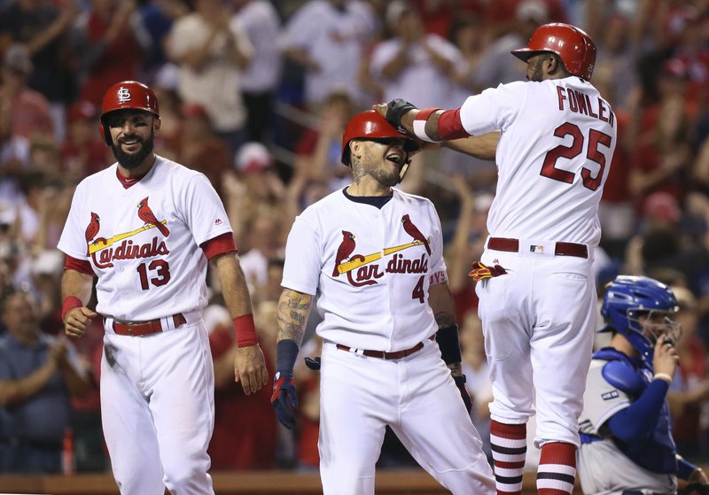 Cards slam Royals with feline help