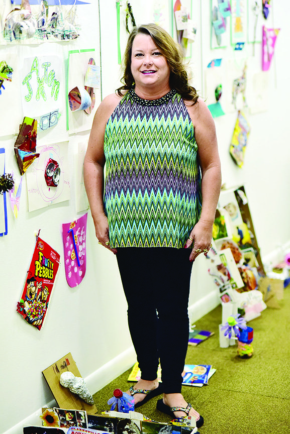 Tanya Hendrix of Russellville began her job as the executive director of the River Valley Arts Center in March. Among recent activities at the arts center were several art camps for students, who displayed their works on the walls of this classroom.