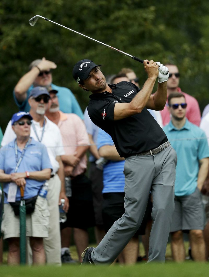 Kevin Kisner of Aiken, S.C., (above) fired a second consecutive 4-under 67 to tie Hideki Matsuyama for the second-round lead in the 99th PGA Championship at Quail Hollow Club in Charlotte, N.C.