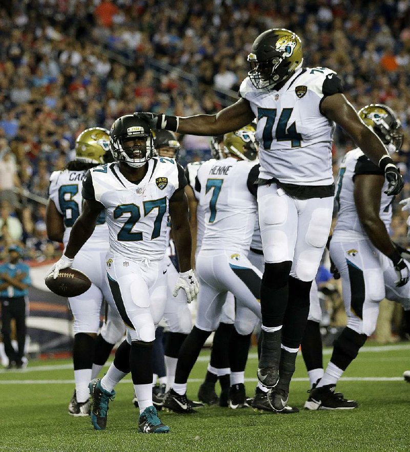 Jacksonville Jaguars running back Leonard Fournette (27) thought the speed of Thursday night’s exhibition
game against the New England Patriots was not as fast as what he saw when he was playing at LSU.