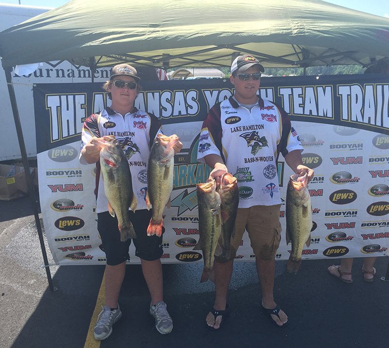 Submitted photo Luke Dodd and Carson Hamilton pose after a competition for the Lake Hamilton Bass-N-Wolves of the Arkansas Youth Fishing Association. Dodd and Hamilton finished second overall in the junior division and set two state records with a one-day total weight of 26.88 lbs. and a two-day total of 30.41 lbs. The duo finished in the top 10 of every tournament they entered and appreciate the support from their families and sponsors.