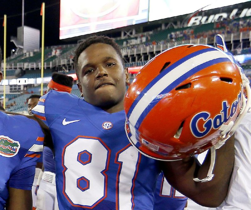 In this Oct. 31, 2015, file photo, Florida wide receiver Antonio Callaway (81) celebrates following an NCAA college football game against Georgia, in Jacksonville, Fla. 