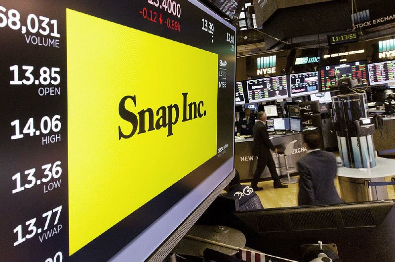 The Snap Inc. logo appears on a screen above a trading post on the floor of the New York Stock Exchange earlier this month. 