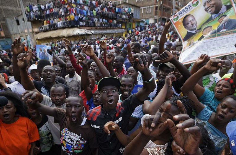 Supporters await the arrival of Kenyan opposition leader Raila Odinga on Sunday in Nairobi.
