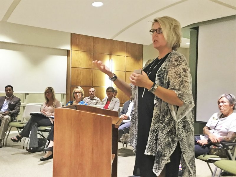 NWA Democrat-Gazette/DAVE PEROZEK Teresa Taylor, interim executive director of institutional policy, risk management and compliance at Northwest Arkansas Community College, speaks Monday during a Board of Trustees meeting in Bentonville.