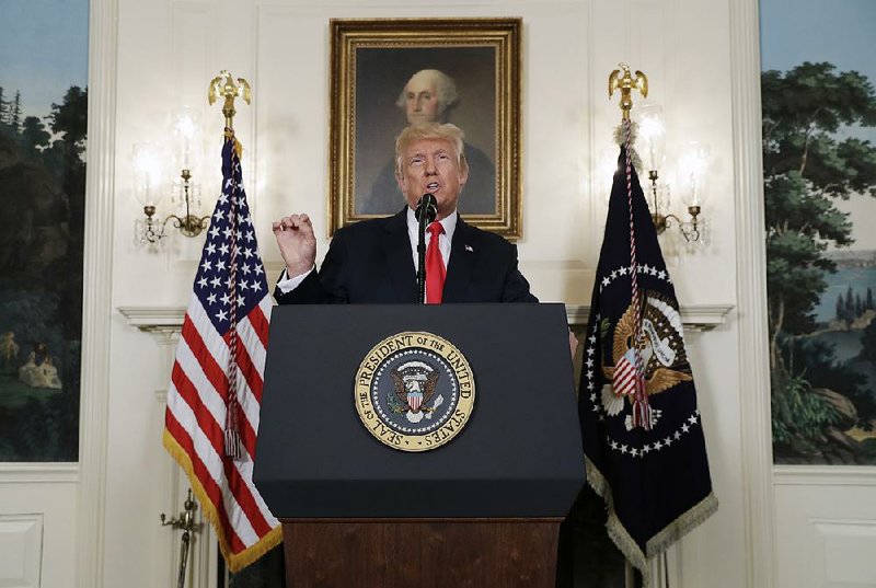 President Donald Trump speaks Monday in the Diplomatic Reception Room of the White House.