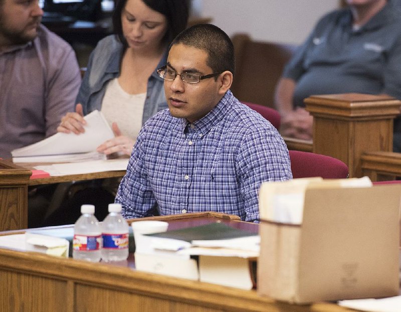 Rodolfo Martinez watches the proceedings during jury selection Monday at the Washington County Courthouse in Fayetteville. Martinez is charged with accomplice to capital murder and accomplice to the unlawful discharge of a firearm from a vehicle in connection with a fatal drive-by shooting in Springdale in April 2015.