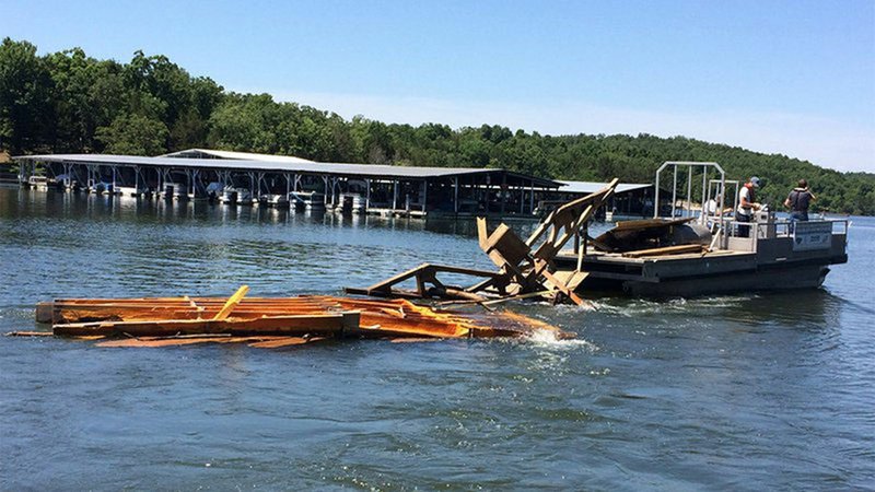 Arkansas Game and Fish Commission and the Army Corps of Engineers teamed up to remove debris from Lake Norfork.