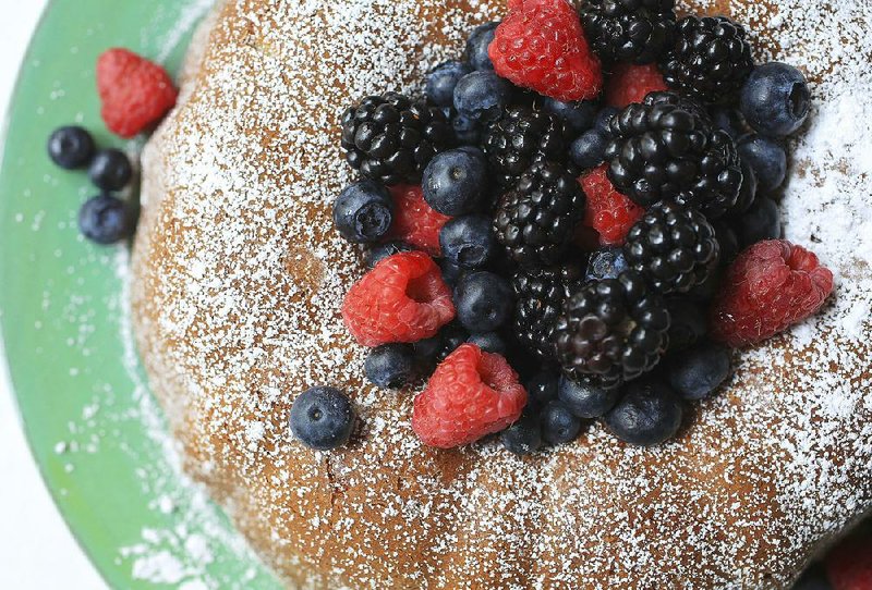 Cream Cheese Poundcake topped with fresh berries