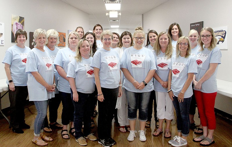 LYNN KUTTER ENTERPRISE-LEADER Lincoln Elementary teachers in kindergarten-second grade, master teachers and special education teachers were trained in a new reading program recently at Northwest Arkansas Education Service Cooperative. Lincoln is one of the pilot schools across the state for the program this year.