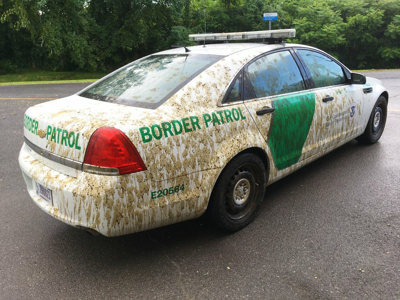 This Aug. 3, 2017, photo provided by U.S. Customs and Border Protection shows a U.S. Border Patrol car that had been sprayed with manure in Alburgh, Vt. 
