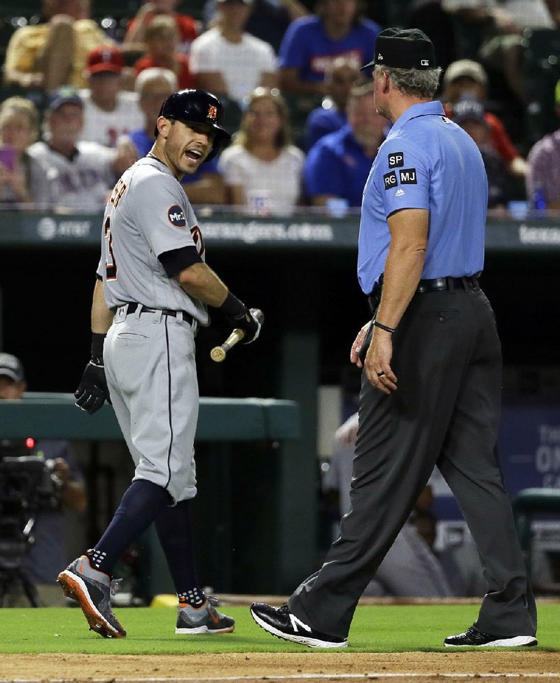 Detroit Tigers second baseman Ian Kinsler argues with umpire Ted Barrett Monday night after being ejected by
home plate umpire Angel Hernandez.