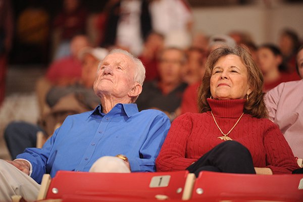 Retired Arkansas athletics director Frank Broyles sits with his wife, Gen Whitehead Broyles before the start of Arkansas' men's basketball game with Alabama Wednesday, Feb. 1, 2017, in Bud Walton Arena.