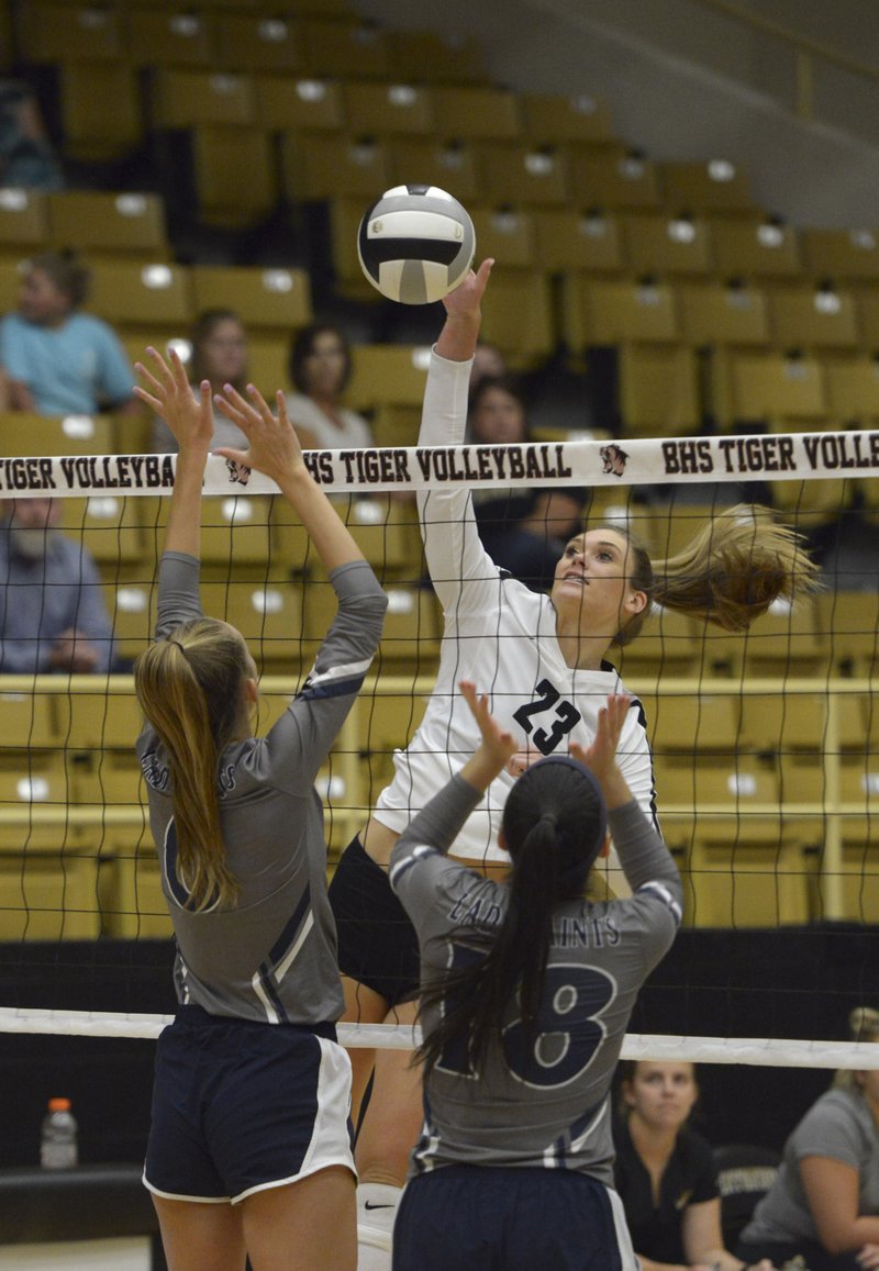 Bentonville High School senior Grayce Joyce makes a spike against Shiloh Christian during a match Thursday in Bentonville. The Lady Tigers’ seniors hope to end Fayetteville’s two-year reign as state volleyball champs.