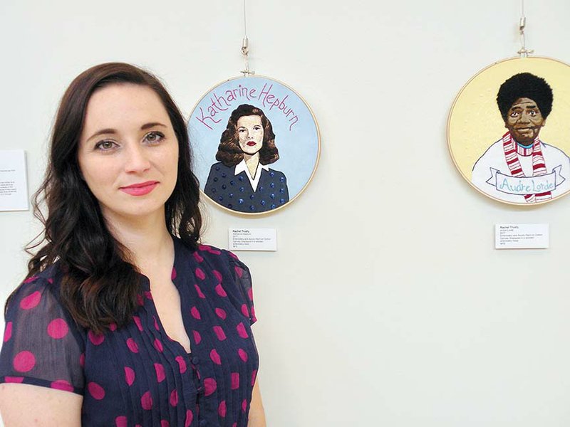 Rachel Trusty of Conway shows two pieces of her fiber art in the exhibit at the William F. Laman Public Library in North Little Rock — Katherine Hepburn and Audre Lorde.