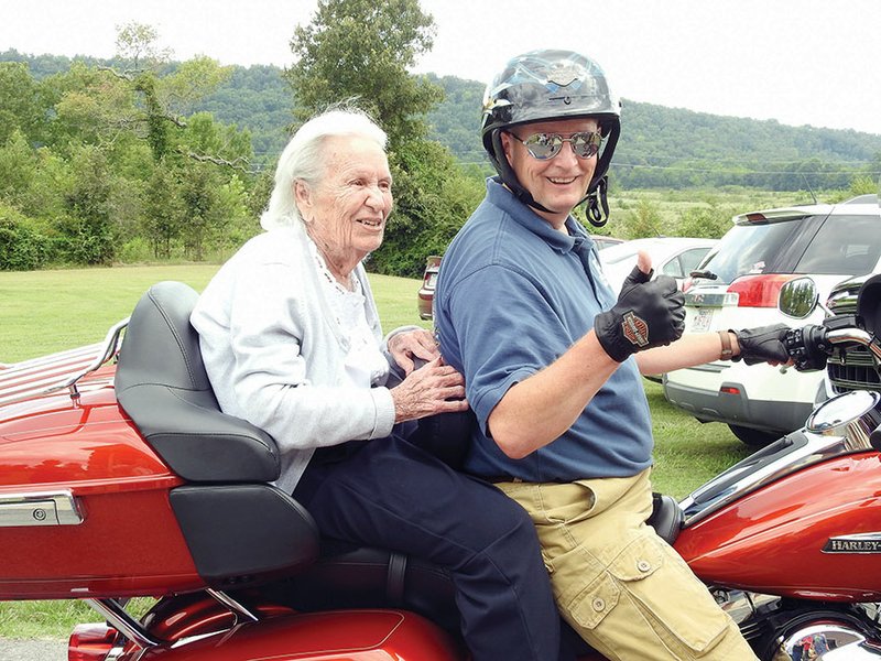 Ruth Wrightam of Greenbrier celebrated her 99th birthday with a ride on Randy Higgins’ 
Harley-Davidson motorcycle. Wrightam said she used to ride a motorcycle with her husband when they lived in Florida. “We’d just go everywhere,” she said.