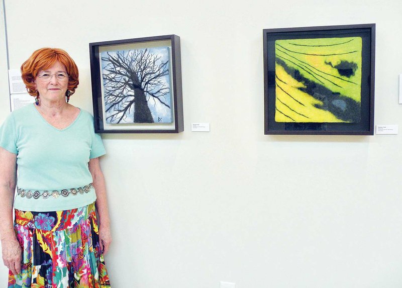 Barbara Cade of Hot Springs has two pieces of work in the All-Women Fiber Arts Exhibition at the William F. Laman Public Library in North Little Rock. She has titled the pieces White Oak Tree, left, and Butterfly. The show will close Aug. 31.